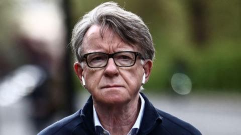 Former UK ambassador to the United States, Lord Peter Mandelson, is pictured as he walks his dog near his residence in central London on April 20, 2026