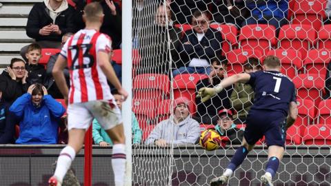 Stoke fans are left open-mouthed as goalkeeper Viktor Johansson scores at own goal 