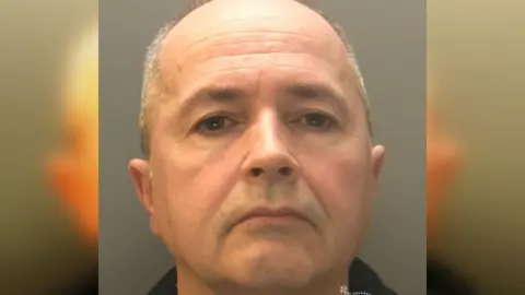 Llun heddlu o Richard Downey