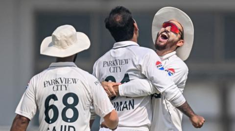 Pakistan celebrate victory over England in the second Test at Multan