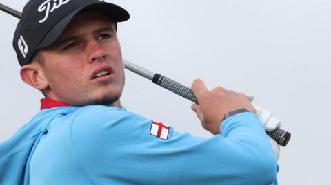 Tyler Weaver hitting a golf shot