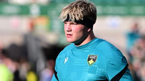 Henry Pollock in a blue Northampton Saints shirt