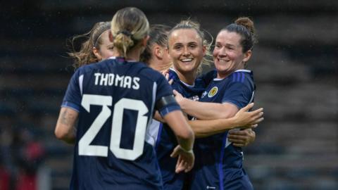 Scotland scored three quick goals in the first half at Dens Park