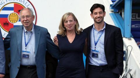 From left to right, Rob Couhig, Missy Couhig and Joe Jacobson pose for a photo