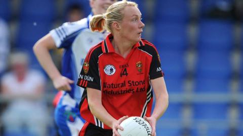 Michaela Downey in action for Down against Monaghan in 2009