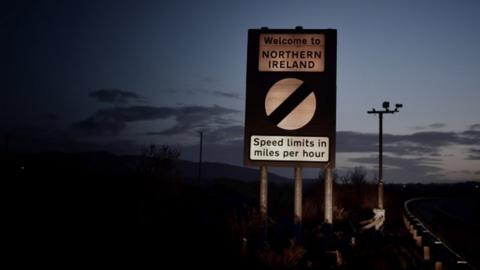 Road sign on border