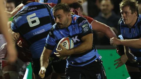Cardiff captain Liam Belcher carries the ball against Scarlets