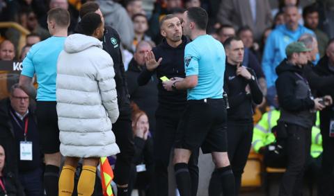 Gary O'Neil tries to reason with referee Chris Kavanagh in the aftermath of John Stones' late winner at Wolves.