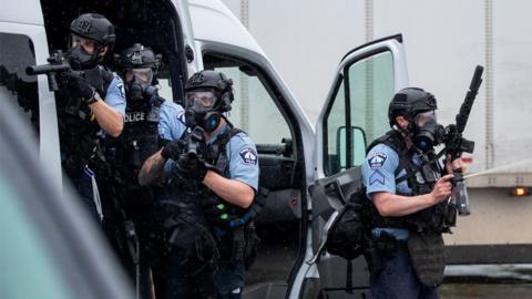 Police clash with protesters at the Minneapolis 3rd Police Precinct in May 2020