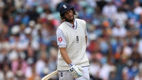 Joe Root looks dejected after being dismissed