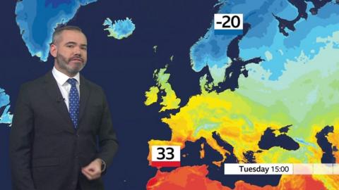 Ben Rich stands in front of a weather map of Europe showing 33C in Spain and -20C in Sweden