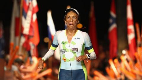 Turia Pitt crosses the finishing line at the Ironman World Championships in Kona, Hawaii