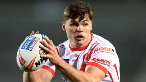 Jack Welsby of St.Helens runs with the ball
