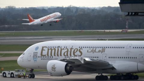 Aircraft depart from Manchester Airport in Manchester in north west England. April 2015