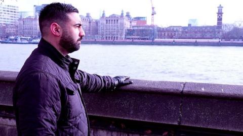 Former prisoner Marc Conway looks across over the River Thames.