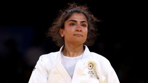 Nigara Shaheen of Team Athlete Refugee looks on during the Women's 63kg Elimination Round 