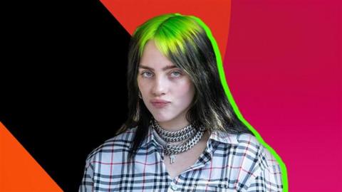 Billie Eilish pouting with green and black hair against a colorful background