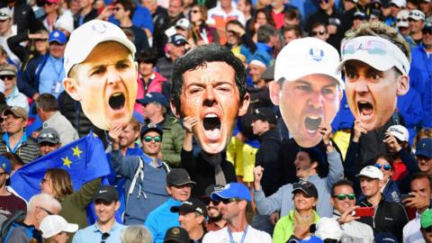 Large masks of Justin Rose, Rory McIlroy, Sergio Garcia and Ian Poulter at the 2018 Ryder Cup in France