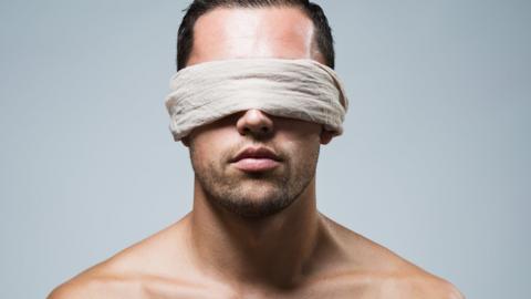 A man blindfolded