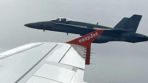 One of the two Spanish F18 fighters seen through the window of the easyJet flight from London to Menorca