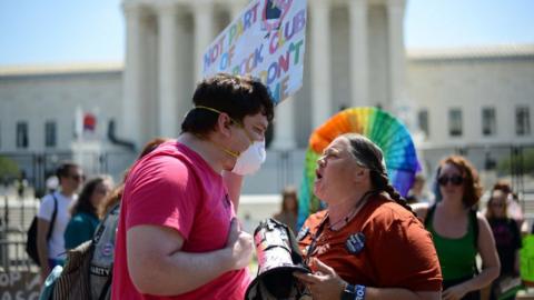 Pro- and anti-abortion activists debate outside US Supreme Court