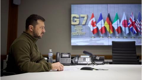 A handout from October shows Ukrainian President Volodymyr Zelensky during a video conference with G7 leaders