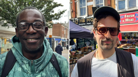 A side-by-side composite of two smiling men outdoors: the man on the left wears thick-rimmed glasses, a patterned green hooded jacket, and a backpack; the man on the right wears large brown-tinted sunglasses, a cap, a grey t-shirt, and a dark waistcoat, standing in front of an outdoor market street with shopfronts.