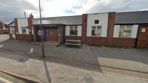 The exterior of a single-storey miners' welfare club