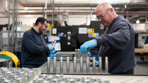 BAE Systems employees work on the tail section of munitions at the BAE Systems factory in Washington, near Newcastle upon Tyne