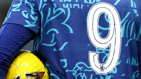 Chelsea top with number nine on back