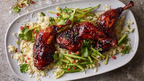 Honey soy chicken with garlic rice and cucumber slaw
