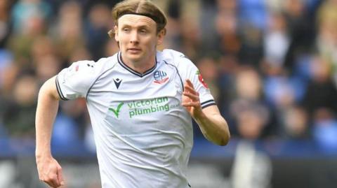 Jon Dadi Bodvarsson in action for Bolton Wanderers against Portsmouth in April 2024.