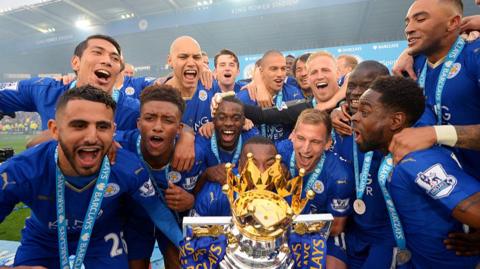 Leicester players lift the Premier League title