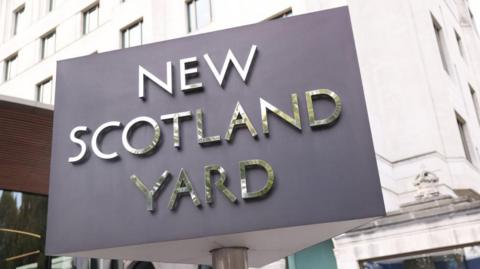 A sign outside New Scotland Yard.