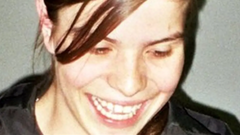 Picture of Lorraine Thorpe. She is looking down and smiling with her hair scraped back from her face