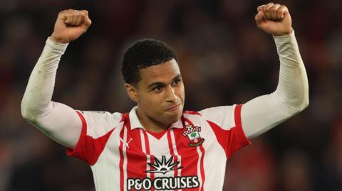 Southampton's Shea Charles raises his hands above his head