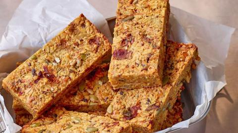 Savoury flapjacks in a tray.