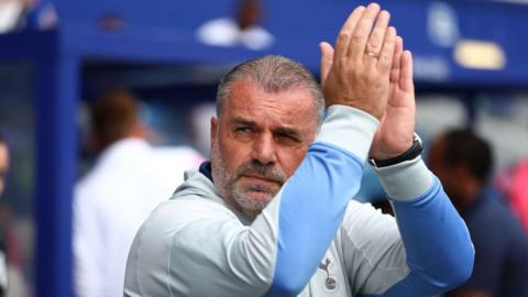 Tottenham boss Ange Postecoglou applauds Spurs fans during the game against QPR