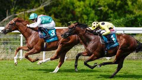 Richard Kingscote riding Qirat 