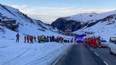 Emergency services working near the scene of an avalanche at Bregenz, Austria