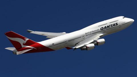 A Qantas plane in the air