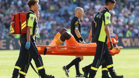 Mory Diaw carried from the pitch on a stretcher