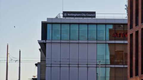 The top half of Nottingham City Council's office in Loxley House - you can see a top three rows of windows and a Nottingham City Council sign on the top