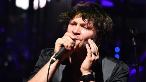 French singer-songwriter Bertrand Cantat performs on stage during a concert in La Rochelle