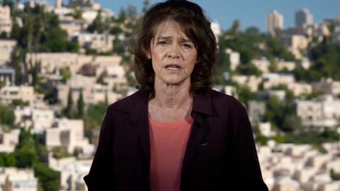 Barbara Plett Usher with Jerusalem behind her