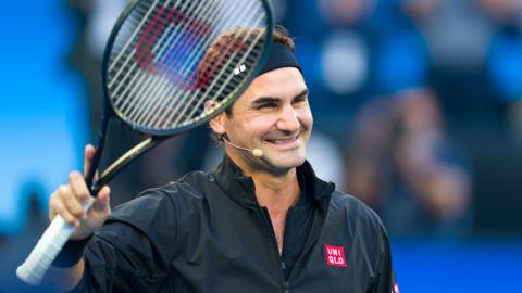 Roger Federer of Switzerland acknowledges the audience as he enters the arena during the Opening Ceremony ahead of the 2026 Australian Open at Melbourne Park on January 17, 2026 i