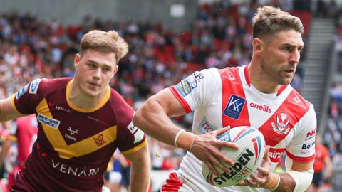 Tommy Makinson (right) has now scored 200 career tries thanks to his hat-trick for St Helens against Huddersfield