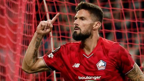 Olivier Giroud celebrates scoring for Lille against Brann