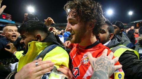 Tom Lockyer celebrates Luton's victory