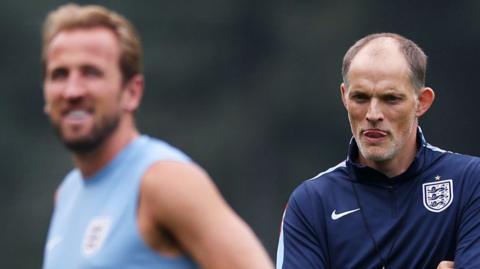 England manager Thomas Tuchel stands behind captain Harry Kane 